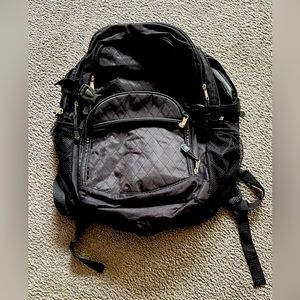 ATHLETIC WORKS BLACK BACKPACK. Lots of Zippers for organizing your gear.